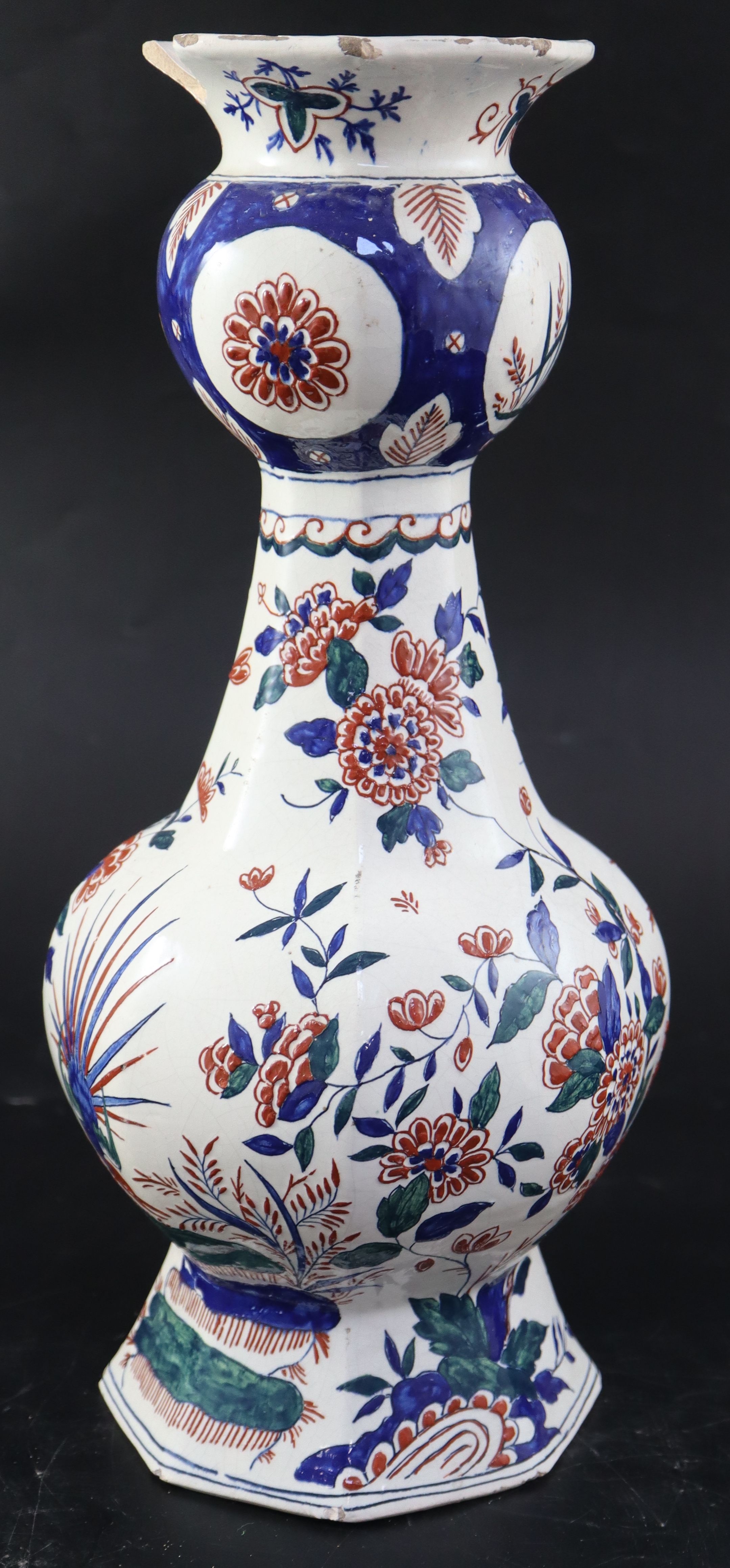 A 19th century faience octagonal vase, height 36cm (a.f.)